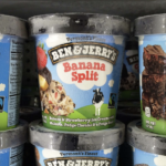 three ben and jerrys pints in freezer at the store